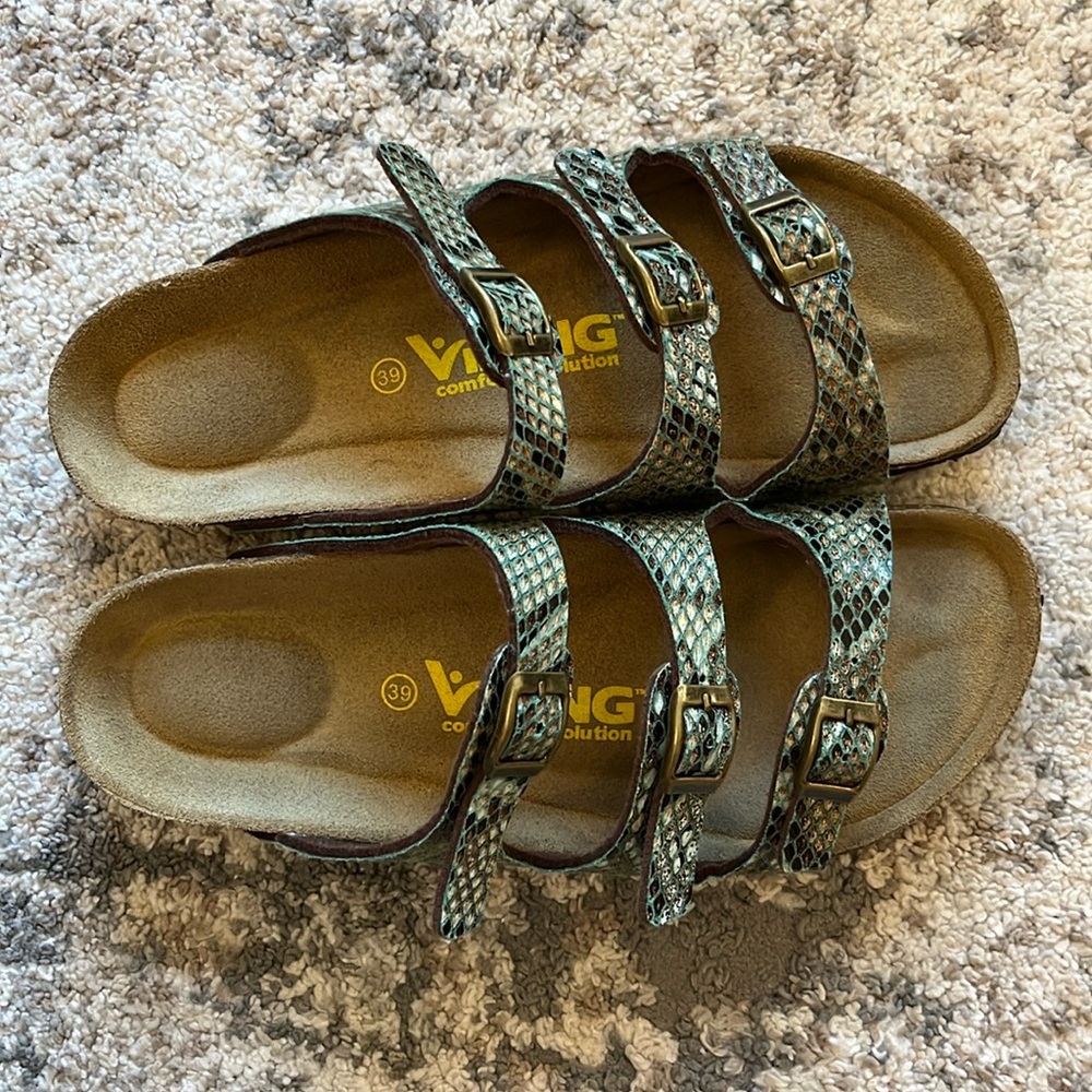 Viking woman’s reptile print slip on sandals. Size 39.